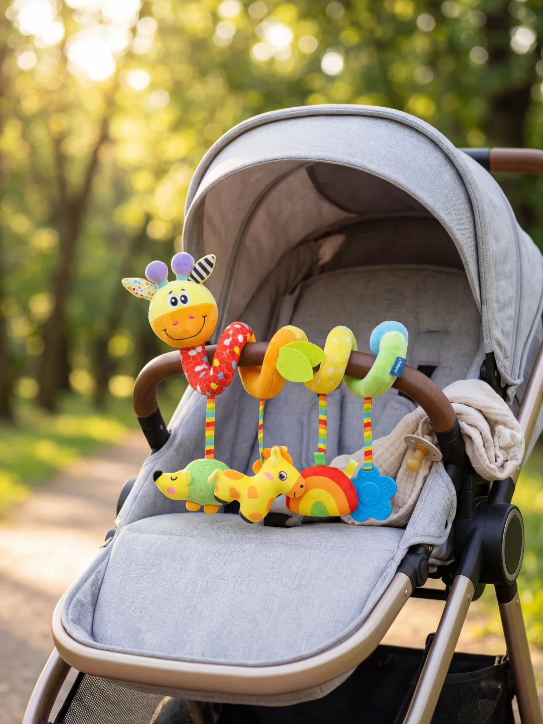 Spirale d'éveil pour siège auto et poussette avec animaux de la forêt, miroir incassable et feuilles en tissu